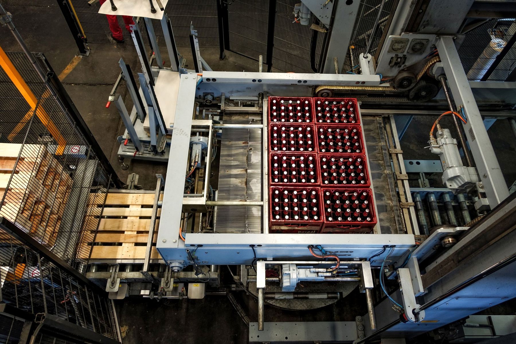 Palletiser loading crates of bottles